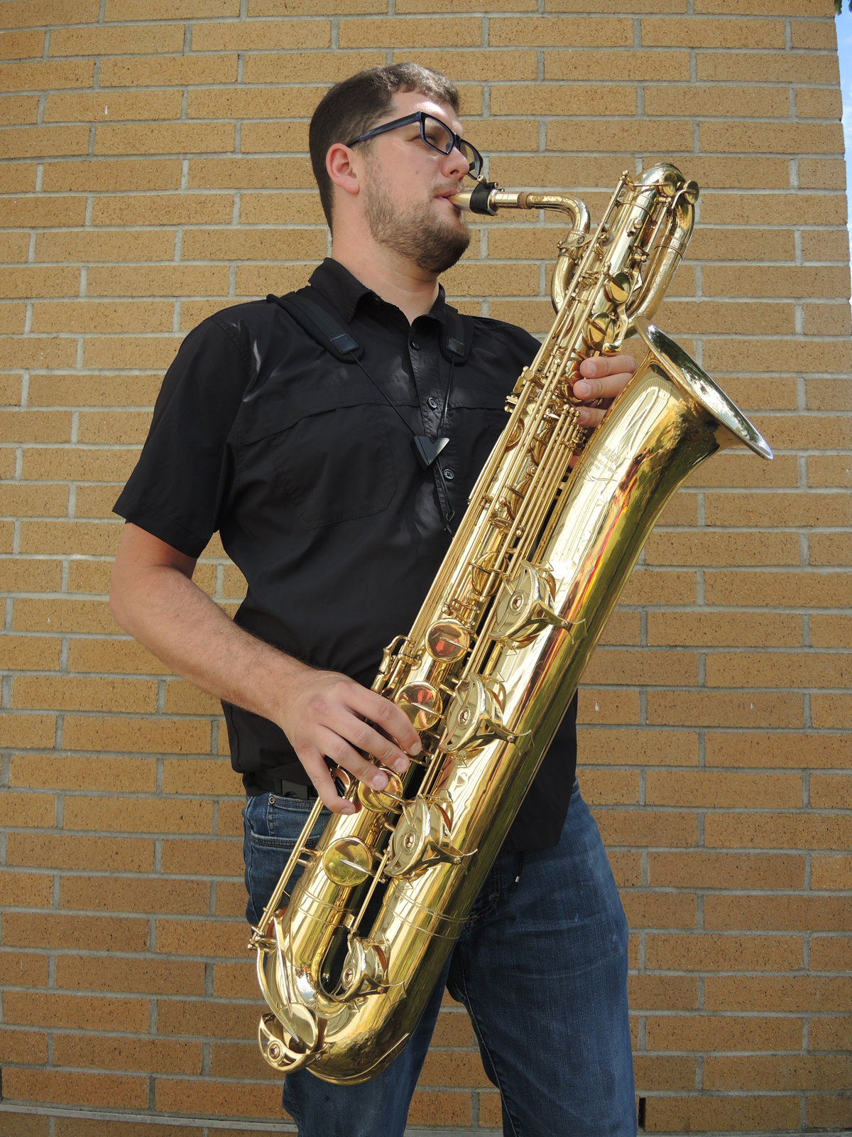 Captain Brad Justason belts out a few notes on his saxophone outside of his home in Belmont Park. Capt Justason is a member of The New Groovement, who will take the stage at Starlight Stadium in Langford on Aug. 27 for the Anchors Away Arts and Music Festival. Photo: Peter Mallett/Lookout