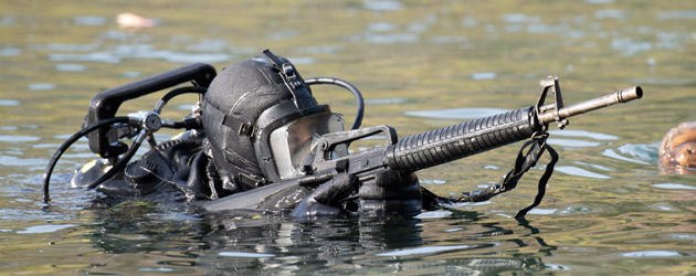 The Canadian Army's 4 Engineer Support Regiment, 1, 2 and 5 Canadian Engineering Regiment practise insertion and extraction from water to land along side other international units apart of NATO as part of EX ROGUISH BOUY at Canadian Forces Ammunition Depot Rocky Point, Colwood, British Columbia on 9 February 2024. EX ROGUISH BUOY fosters important international partnerships and prepares combat dive teams for engineer reconnaissance tasks and other tactical operations. Photo: Sailor First Class Brendan McLoughlin, Canadian Armed Forces Imagery Technician