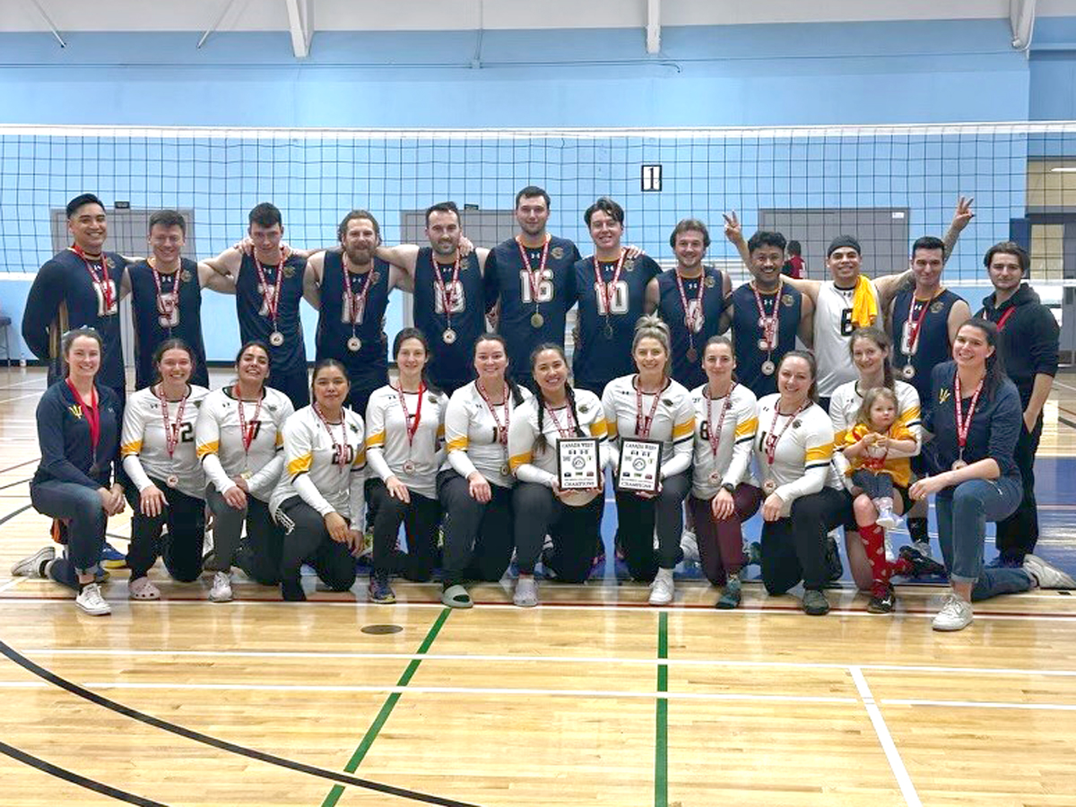 Members of the Esquimalt Tritons women’s and men’s volleyball teams celebrate their Canada West Regional Volleyball Championship victories, Feb. 16 in Winnipeg, Man. The women defeated Edmonton 3-1 in their gold medal game while the men recorded a 3-0 win over Cold Lake.