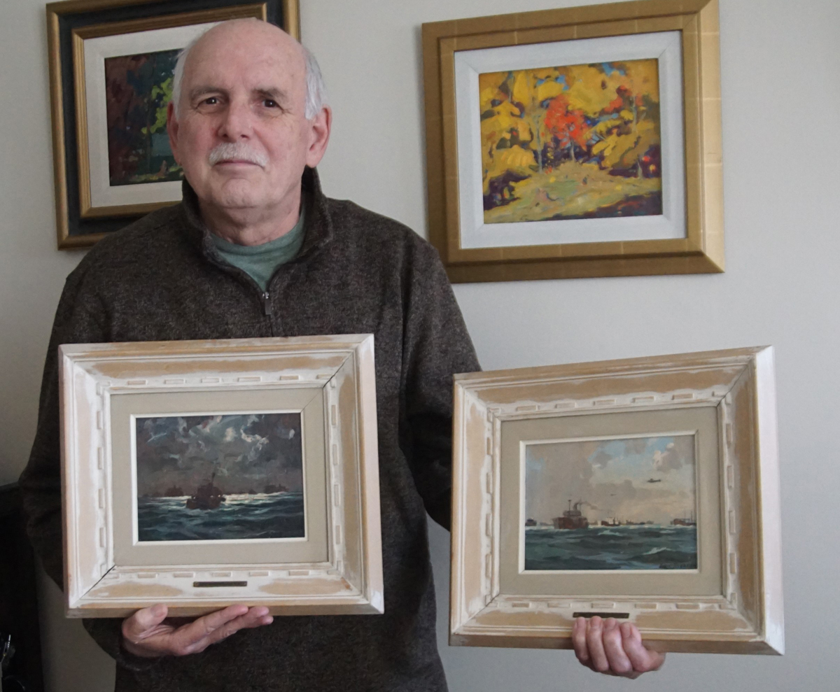 David Emmerson holds his pair of LCdr Riordon paintings numbers 18 and 12 in the Convoy series. It was their purchase in 2020 that got him started on the project of researching their origins.