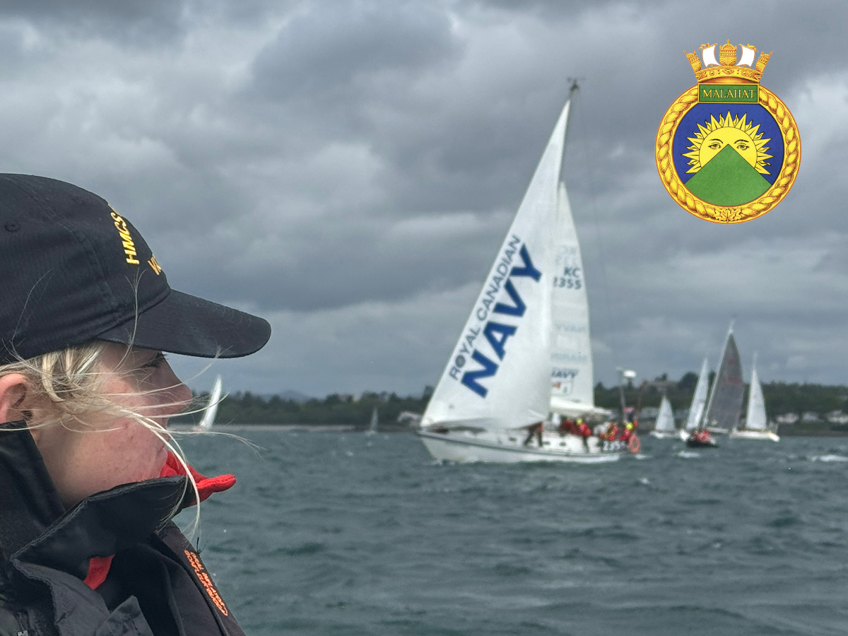 Sailor 3rd Class Isabelle Maguet of HMCS Malahat keeps a close eye on the 135 boats at the start line of the 79th Swiftsure Yacht Race, including the Royal Canadian Navy training vessel Goldcrest, centre, off Clover Point on May 25. Photo: Lieutenant (Navy) Donald Den.