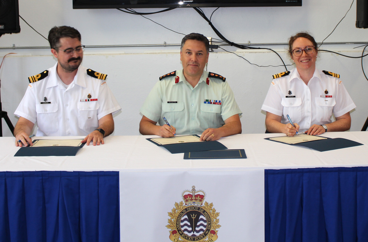 Lieutenant-Commander (LCdr) Craig Newman, outgoing Commanding Officer (CO) of Canadian Forces Ammunition Depot (CFAD) Rocky Point, Colonel Guillaume Arciuette, Commander Canadian Material Support Group, and LCdr Chantal Woolley, incoming CO, attend a Change of Command Ceremony at CFAP Rocky Point.