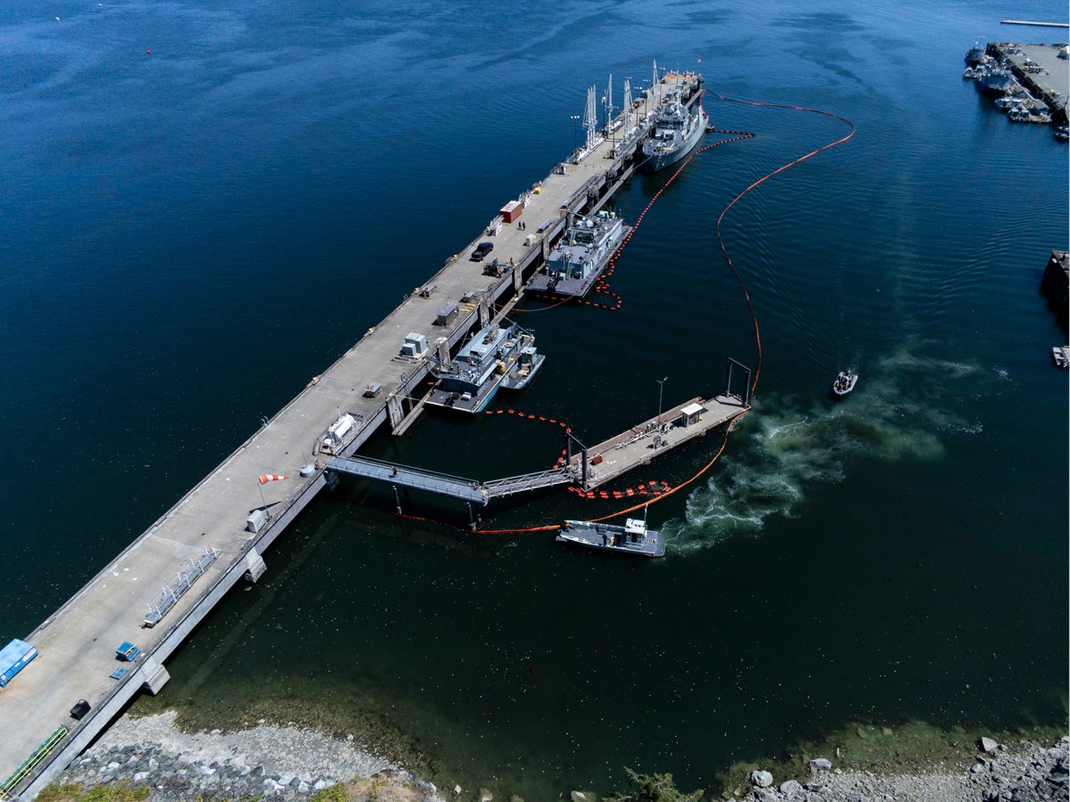 Members of the Incident Response Team conduct a spill response exercise (SPILLEX) at Canadian Forces Base Esquimalt, British Columbia on July 10.
Photo: Sergeant Malcolm Byers, MARPAC Imaging Services