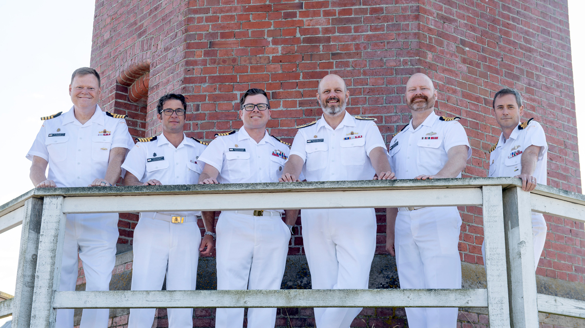 Photo: L-R Capt (N) Kooiman – Addiction-free Living / Social and Organizational Wellness / Family Violence Advisory Committee; Capt (N) Roberge – DAGPWD; Capt (N) Patchell – DVMAG / Active Living; RAdm Robinson; Capt (N) Sproule – DTPAO /Mental and Social Wellness; Capt (N) Stefanson – DWAO; Not shown: Capt (N) Whiteside – DIAG / Healthy Nutrition.